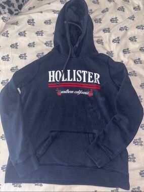 Hollister Navy Blue Pullover Hoodie with Red & White Graphic